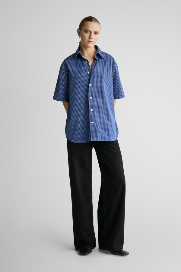 Brass Tee Blue Clerk Check